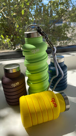 The que Collapsible Water Bottle with Key Chain