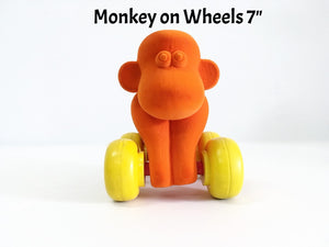 Velvety-soft, eco-friendly, and safe monkey on wheels for babies and toddlers