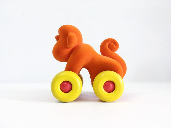 Velvety-soft, eco-friendly, and safe orange monkey on wheels for babies and toddlers